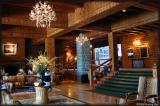 The bar in the main foyer; pictures of historical events by the stairs in the back