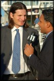 Former Shark player Mike Ricci is interviewed by NBC11 sports reporter Raj Matthai