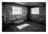 Deserted stone hut interior