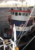 Tugboat helps us dock in tight spot