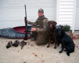 Ross Reynolds with Remington and Zoe after a successful day on the water.