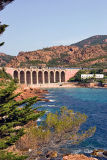 Two trains crossing on the Anthor bridge.