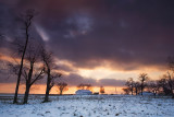 Winter farm sunset