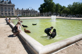 Doggies in the fountain by Ecole Militaire