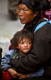 Mother and child asking for money.  Lhasa, Tibet.