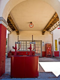 A closeup of the archway with mobil gas globe and oil pumps.