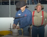 Milking the Venom from the snake, they do that to each snake before it is butchered