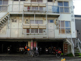 The Rider House. Its 8 to a room w/ side by side sleeping. Smoking is allowed.