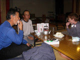 Relaxing after a hot onsen bath. Owner offers us some fruit.