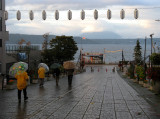 The threat of rain persisted through the evening.