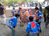 Kids perform a short dance.