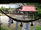 The shimenawa (twisted rope) is for luck and to keep evil out.