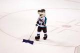 Sharkie shoveling snow