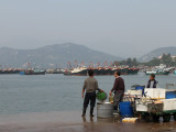 Fishermen unloadin