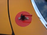 BOSCH Ignition Kill-Switch installed from under the cawling, Note the red painted key and identifying circle.