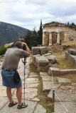 Delphi - photographing the Athenian Treasury.jpg
