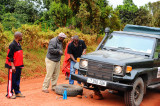 Duncan & Moody help change the flat tire