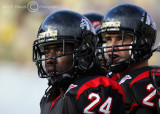 Gardner-Webb DB Terron Williams and teammates nervously eye the clock as it ticks down in the fourth quarter
