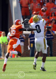 Jackets WR Demaryius Thomas halls in a pass in front of Tigers CB Maxwell