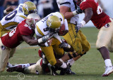 Yellow Jackets QB Nesbitt twists his ankle as he is tackled by Noles LB Derek Nicholson