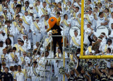 Yellow Jackets mascot Buzz leads the crowd from the band stand