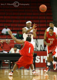 Cats G Wise makes a pass from the back court before making contact with MVS G Harmason