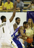 Georgia Tech G Clinch guards Tennessee State G Robinson with help from G Iman Shumpert