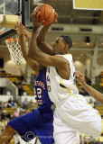 Yellow Jackets F Aminu pulls down a rebound over Tigers G Robinson