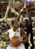 Georgia Tech F Alade Aminu eyes the basket as his brother, Wake Forest F Al-Farouq Aminu, defends