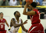 Yellow Jackets G Clinch defends against Terrapins G Mosley