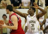 Tech F Gani Lawal gets his hands up while defending N.C. State C McCauley