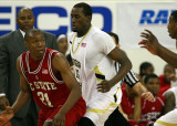 Georgia Tech F Peacock holds his ground against N.C. State G Williams