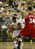 Jackets F Lawal drives the baseline against Wolfpack C McCauley