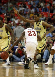 Yellow Jackets F Aminu fights to stay in front of Seminoles G Douglas