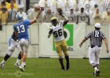 Georgia Tech DE Osahon Tongo extends to disrupt a Carolina QB Yates pass