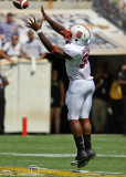 NC State RB Greene goes up to catch a pass…