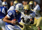 …Georgia Tech LB Burnett bears down on Duke QB Renfree…