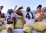 Yellow Jackets OLB Egbuniwe celebrates the win over Duke with teammates and the fans