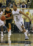 Yellow Jackets G Maurice Moe Miller leads the fast break across mid court