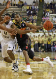 Terrapin G Bowie drives the lane and dishes to a teammate