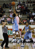 Tip-off between Jackets F Alex Montgomery and Tar Heels F LaToya Pringle
