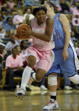 Tech G Jacqua Williams goes baseline to get around a Heels defender