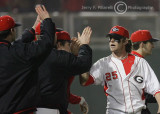 Bulldogs DH Fields celebrates with teammates after getting the first victory of the season