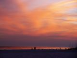 People walking on beach at Sunset, Orange Beach AL USA