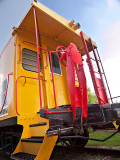 A Classic Caboose in red and yellow,<br> through this door passed a Conductor Fellow<br><b>by Waynecam