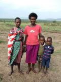 Masai Family- Check out the kid sticking his tongue out!