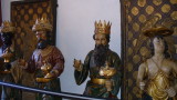 The 3 Magi honor the statue of the Madonna and child on the outside by tipping their crowns as they go by.