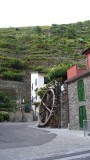Manarola means water wheel, in the local dialect.  There used to be a large river running through the center of town.