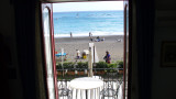 Looking out our balcony doors at the beach.