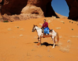 Suzie at the Ear of the Wind Arch